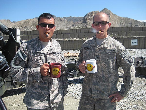 CPT James Mason and 1LT Mike Brennan (A/2-320th FAR, 1BCT, 101st ABN) enjoying an afternoon smoke at COP Garcia, Afghanistan.