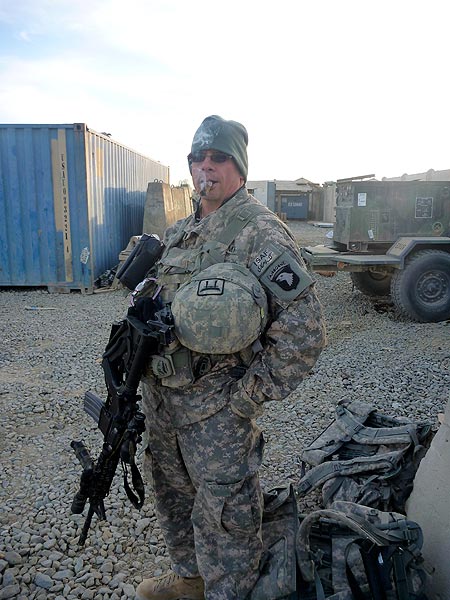 CPT Sgroi in Afghansitan OEF10-11, smoking in the bunker at small COP prior to mission.