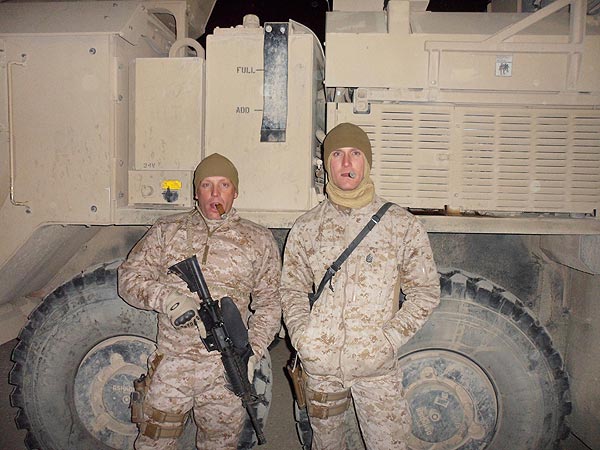 Spencer and John getting ready for a convoy in Afghanistan