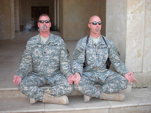 SFC Curtis Ellis and COL David Mullins demonstrate the Zen of Smoking at Al Faw Palace, Camp Victory, Baghdad, Iraq.