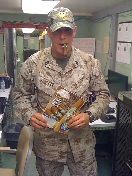 Gunny Devor after receiving a shipment in Southern Afghanistan. "Thanks CI for the fast shipment."
