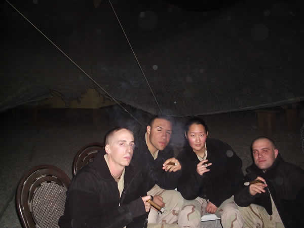 This picture is of one of the many nights that we take a cigar break on from work. We are currently deployed in Kandahar Airfield, Afghanistan. We are from the 125th MI Bn and the 25th Engineer Detachment from the 25th ID.