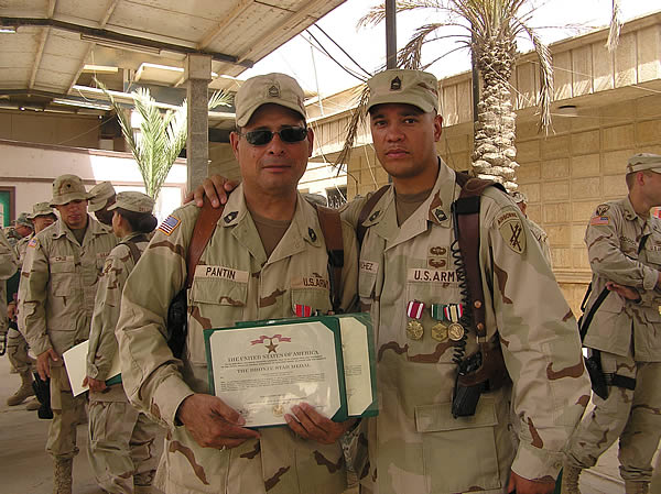 Master Sgt. Gerard Pantin, right Master Sgt. Israel Sanchez.