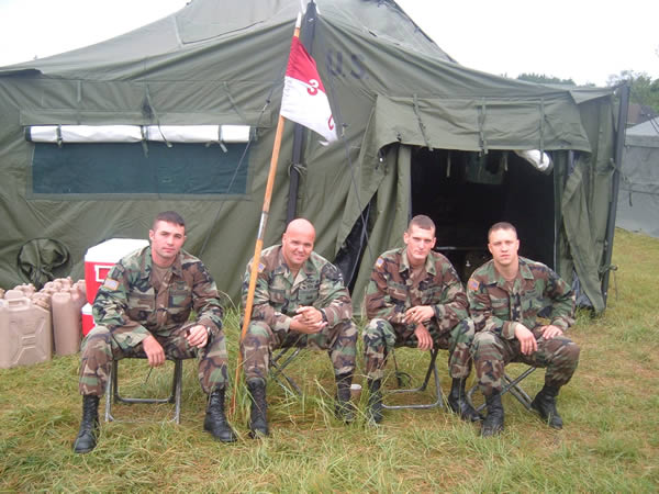 From left to right- CPL Iman, 1SG Williamson, SPC Weldon, and PFC Venable of C troop, 3-6 Cavalry Regt. enjoying an evening smoke in the Republic of South Korea.