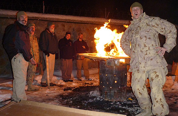 Camp Julien Cigar Club, Fire Pit Smokers. "We make it warm enough to smoke cigars."L to R: MAJ James Humen (CAN), DoD Civilian Brad Tischler (USA), MAJ Thomas St. Onge (CAN), DoD Civilian Mike McBurnett (USA), DoD Civilian David Gault (USA), DoD Civilian Ryan Richter (USA)