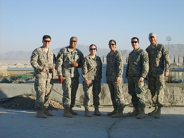 "The attached photos are from an airfield in Afghanistan. Our cigar club &rsquo;meets&rsquo; every Saturday night on the rooftop of our building for smokes and watching the fighter jets streak down the flight line and off into the night&rsquo;s sky. ...We have a little more than a month left and the cigar club has been one liberty that has helped the time move right along!"-Daniel Geisler