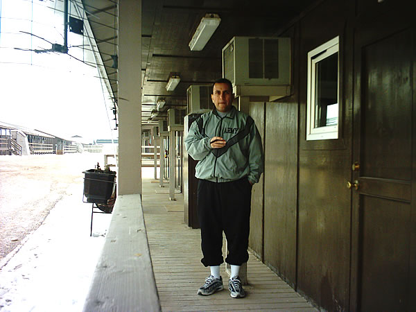 MSG Joe Castro, of Task Force Falcon, enjoying a Gloria Cubana outside the living quarters of Camp Bondsteel, Kosovo.
