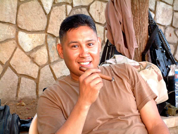 CW2 Johnny Moncada, enjoying a Romeo y Julieta cigar in Mosul, Iraq.