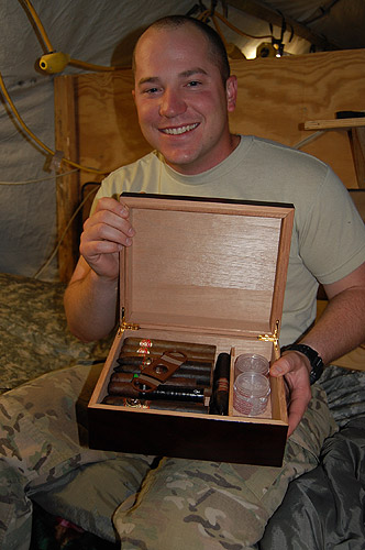 LT Weadon with his new humidor and cigars from Cigars International