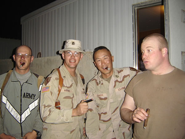 SGT Tony Skaja, SSG Mitchell Haynes, SFC Steve Otamura, and SSG Doug Benson of B Troop, 1st Squadron, 11th Armored Cavalry Regiment enjoying CAO Black and La Perla Habana.