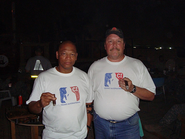Some of the guys at the Camp Taji Mudhouse sporting their new CI shirts and enjoying a cigar.