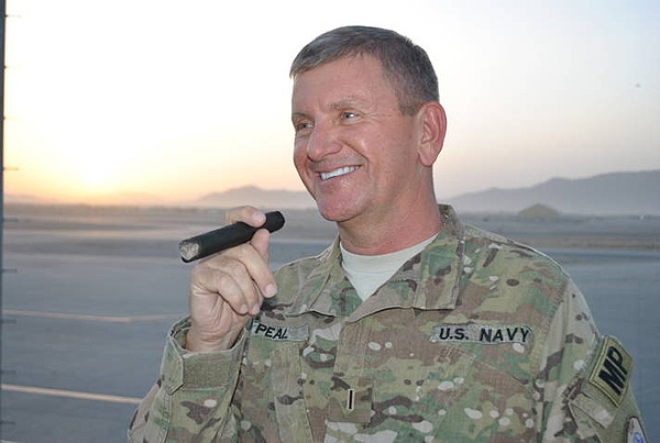"Every evening when the sun goes down in Afghanistan: we get together to trade and smoke cigars, and drink "non alcoholic" beer."