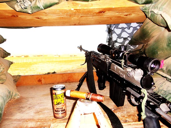 Casey Cordova&rsquo;s cigars and firearms. "Thanks for your excellent customer service here in Afghanistan."