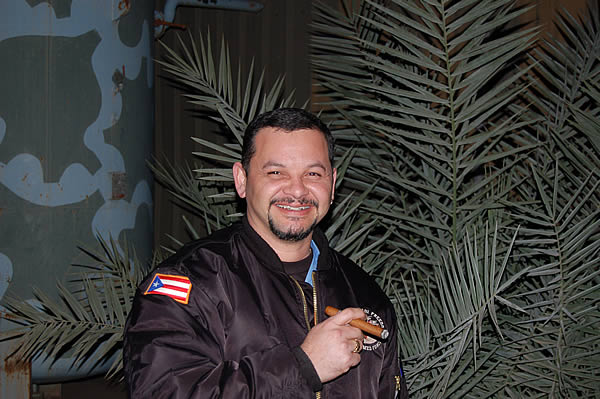 GS-11, H&eacute;ctor Rub&eacute;n L&oacute;pez, deployed in Iraq. Balad Air Base Iraq smoking a Cohiba Siglo V.