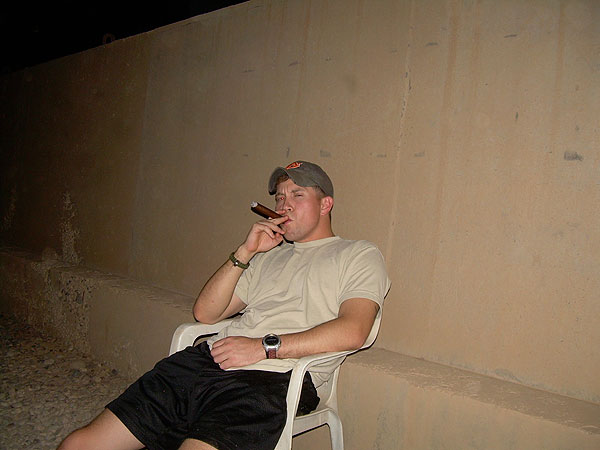 SOTF-N Cigar Club member SSG Scott at COB Speicher having a smoke.