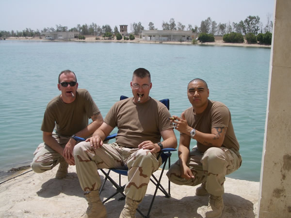 LN2(SW/AW) Steven D. McAnally, LN1(SW/AW) Jeffery T. Baugher andLN2(SW/AW) Marc Carrillo enjoying the Victor Sinclair "Bevy of Bohemians"sampler pack at Camp Victory South, Baghdad, Iraq.