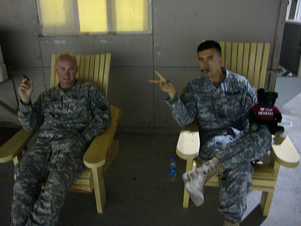 TF 7-101 from Ft Campbell, Ky, enjoying a fine cigar from CI at Baghram Air Base, Afghanistan