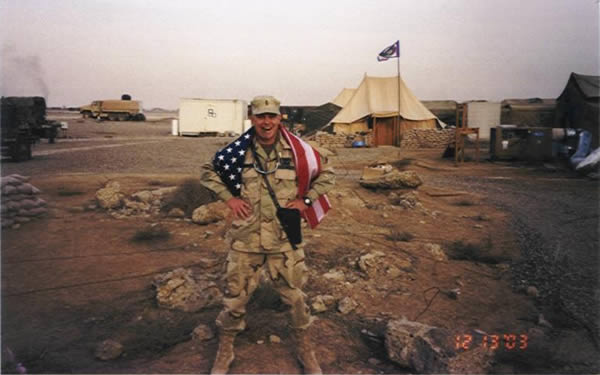 CW2 Jamie Kavanagh smoking a Romeo y Julieta Gran Reserva (Cuban) the day Saddam was captured. Balad, Iraq.
