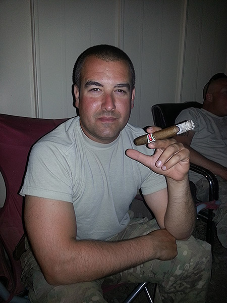 Staff Sergeant M. Schmitt in Afghanistan enjoying a 5 Vegas Classic that he had just received in the mail that day. "Thanks for the FPO shipping!!!"