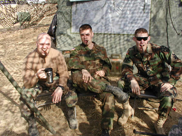 1SG Williamson, PFC Boles, and PV2 Rivers of C Troop, 3-6 Cavalry Regiment,2nd Infantry Division, enjoying a nice cigar in the ROK.