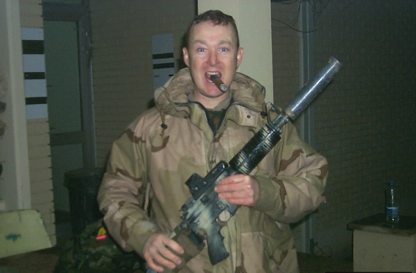 Here I am smoking a wonderful ACID Kuba Kuba from CI on Christmas Day.  This was taken as I came in off a patrol near LSA Anaconda (Balad Air Base) in which we had hit an IED and flipped our HMMWV. Luckily no one was injured. It had been raining all day and I am soaked to the skin, but nothing beats a good cigar to celebrate being alive. Keep up the good work and the fine products.Sincerely,William E. PalmerMAJ, INProvost Marshal81st BCT, WAARNG