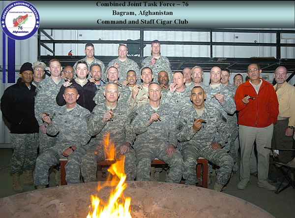 The Combined Joint Task Force Headquarters - 76 Command and Staff in Bagram Afghanistan. Every Saturday they get together after their shift to have a cigar and fellowship.