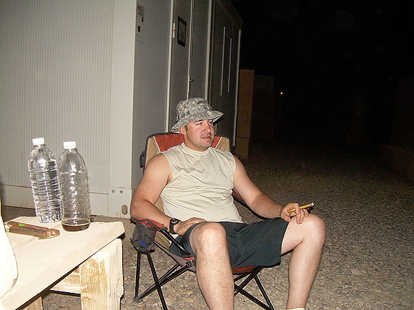SOTF-N Cigar Club member SGT Lamon at COB Speicher having a smoke.