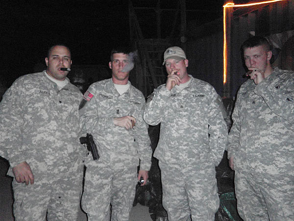 From left to right: Spc Alicea, 1SG Mitchell, Sgt Whitaker and Sgt Rich enjoying a smoke break in Mosul.