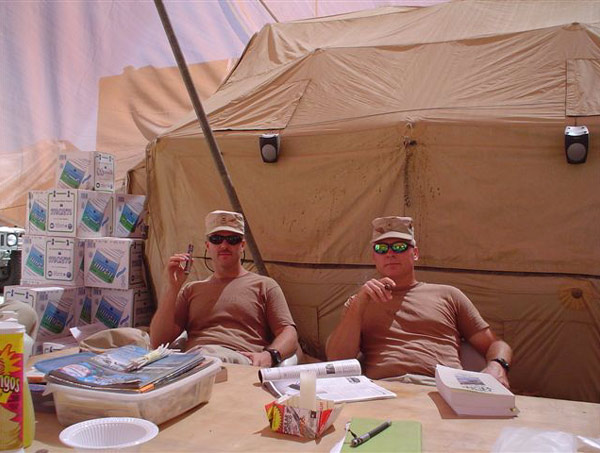 CW2 Ray Evans and CW2 Todd Graham, members of 151st Signal Battalion supplying comms to users at Baghdad International Airport.