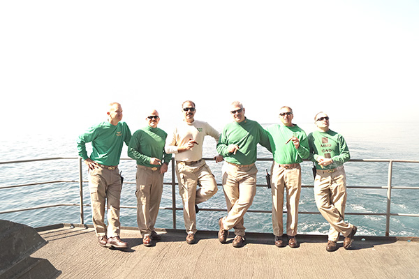 A picture of the Aircraft Intermediate Maintenance Department Division. Officers enjoying the beautiful afternoon with a CI Cigar. "Thank you for your exceptional customer service and continued support. This photo was taken on 19 February 2016 on the Fantail of the USS HARRY S. TRUMAN while deployed in support of Operation INHERENT RESOLVE."