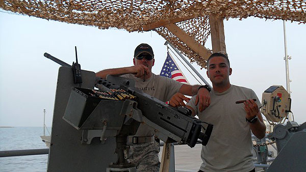 SPC Way and SPC Hunsinger from the 709th TC DET1 enjoying a smoke in Iraq on the stern of the LCU 2018 Five Forks. "Yes the Army has boats!"