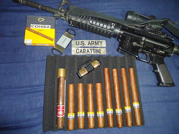Spc. Carattini, M&rsquo;s Cuban Cohiba&rsquo;s resting in a in travel humidor bought from CI. "I decided to take a picture so all cigar aficionado&rsquo;s can have a glance at these babies.."