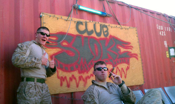 L to R: Cpl Mike Wilson and Cpl Wade Laurent of the 6th SSCT smoking in Afghanistan.