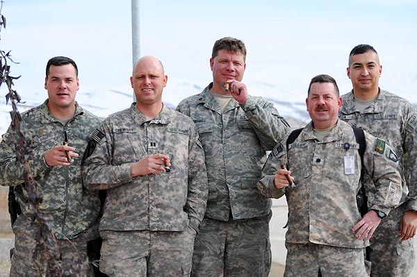 Soldiers of the Operational Coordination Center Region East, OCC-R(E), Afghanistan. "We enjoy smoking cigars as we discuss business, game plan, and coordinate efforts throughout the day."