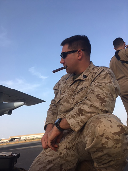Enjoying a cigar after a mission.
