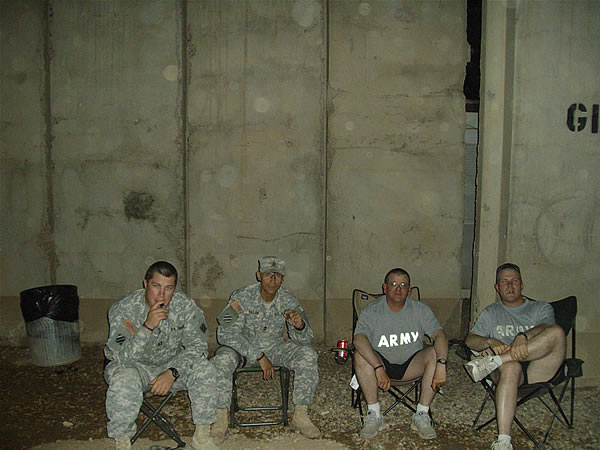 CPT Page, 1SG Taylor, SSG Minnich, & SFC Sydnor from B Co 26BSB in Iraq enjoy some of Cigars International&rsquo;s finest.