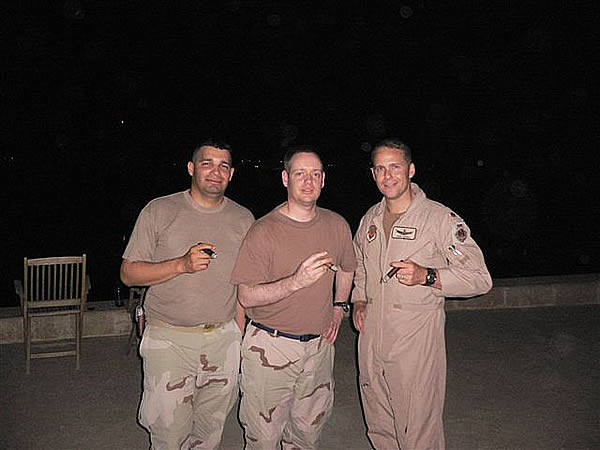 From left to right: "Cas", "Gino" and "Stich" enjoying some CI cigars in Baghdad on Memorial Day.