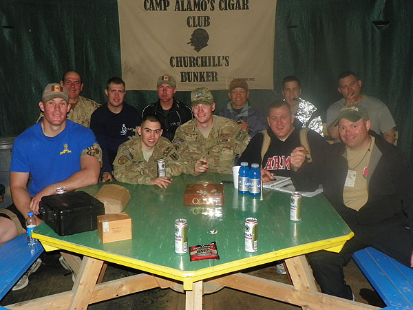 Warrant Officer Jeff Collier and other members of Camp ALAMO in Afghanistan enjoying cigar smoking. "...we really appreciate your outstanding customer service and very prompt delivery times considering our location..."