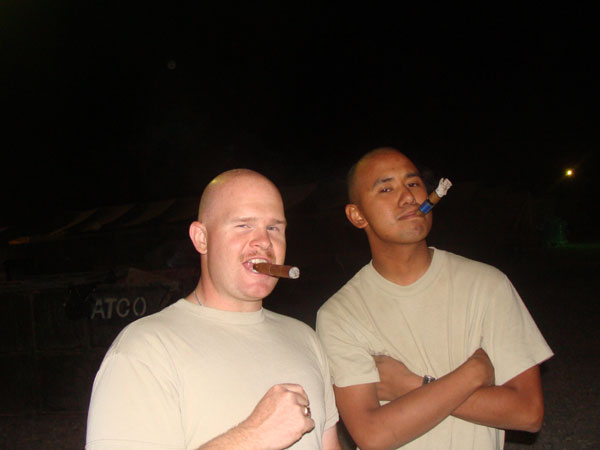 Soldiers enjoy their "cigar night" in Iraq, which is more of an opportunity to bond and decompress as it is to share tastes in fine cigars.