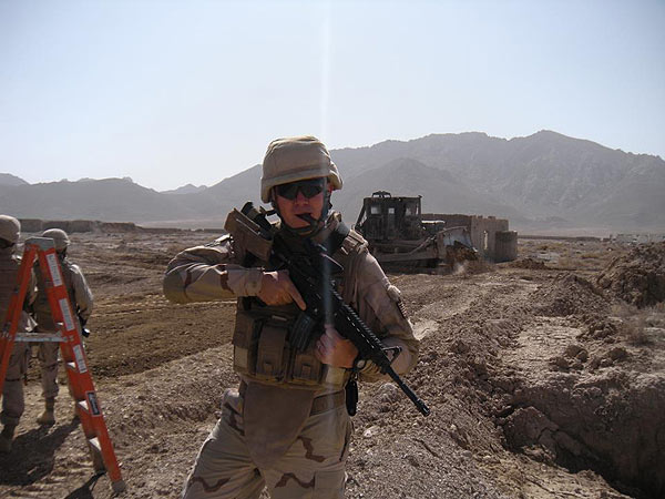 SCW Simons, Brandon stationed with NMCB 7 (Navy Seabees) smoking a Gurkha in Afghanistan. "Thank you for all you do to keep us happy over here!!"