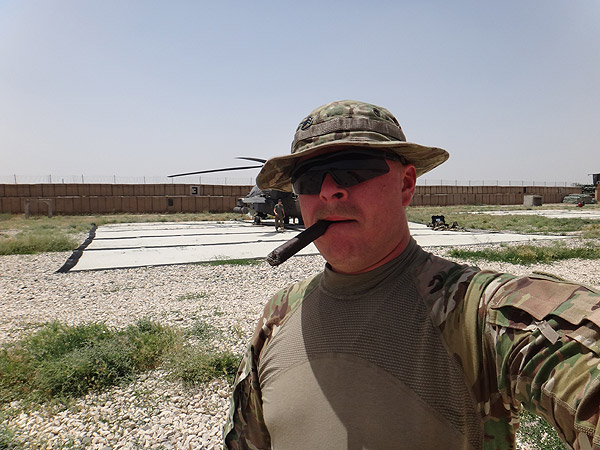 "It's 11:00 am and 103 degrees with no shade but it wont stop me from smoking a good cigar. Thanks CI."  1-104th ARB TF Iron Warrior in Afghanistan, May, 2013.