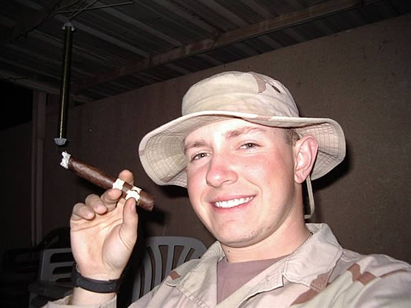 A1C Bryan D. Carrillo, USAF, enjoying a smoke at Camp Victory, Baghdad, Iraq.